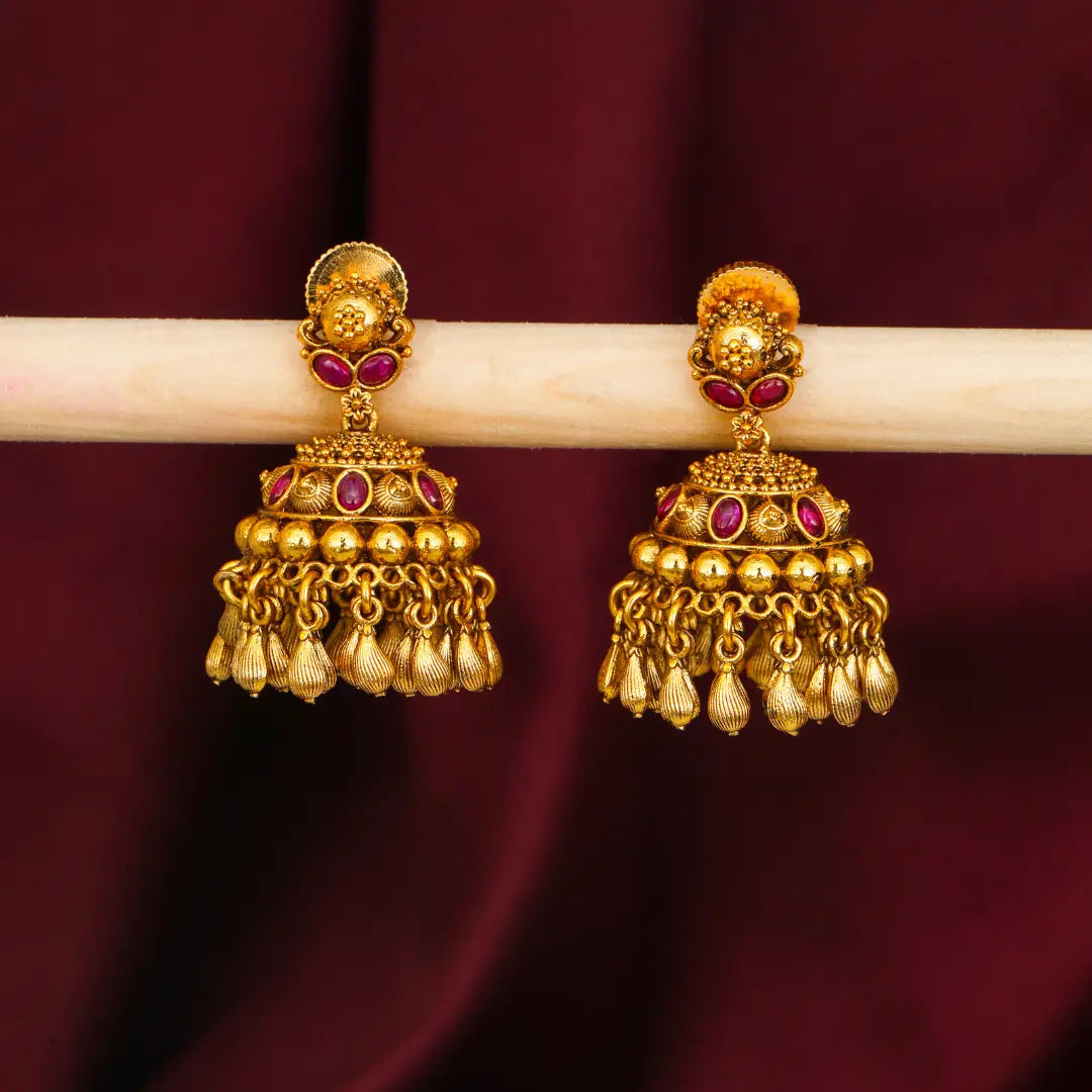 Trendy Minimalist Temple Jhumkas – Antique Gold Ruby Drop Design