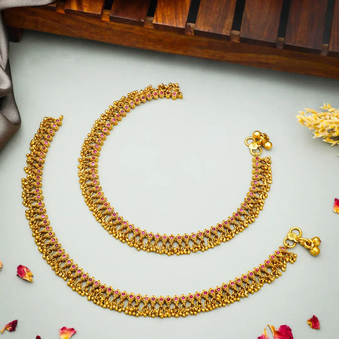 Traditional Gold Plated Temple Payal with Pink Stone Detailing