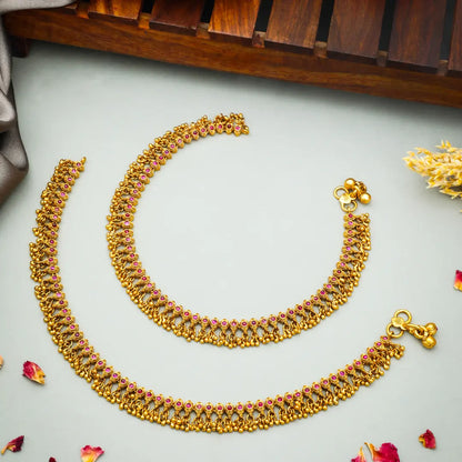 Traditional Gold Plated Temple Payal with Pink Stone Detailing