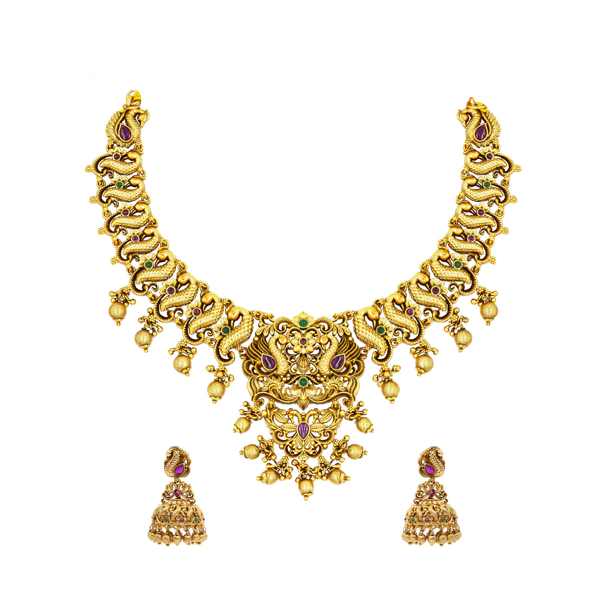 Gold necklace and earrings set on a white background