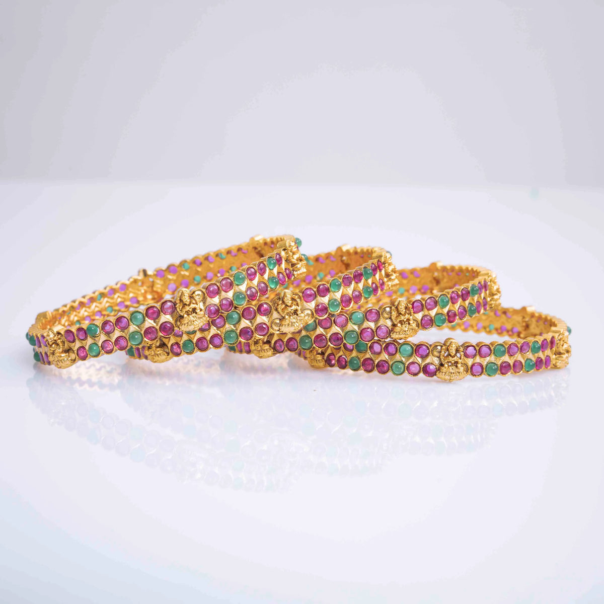 Divine Laxmi Temple Bangles in Gold Finish with Ruby-Green Stones K-995